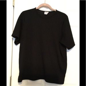 Black cap sleeve top with variated black design